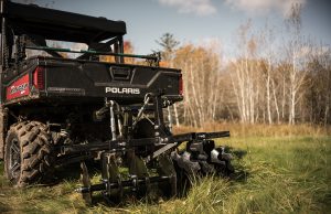 PUT YOUR UTV OR ATV TO WORK THIS SUMMER WITH KOLPIN TOOLS AND IMPLEMENTS