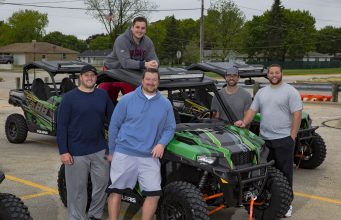 Aaron Rodgers Gifts Packer Offensive Line Vets with Custom Polaris General Vehicles