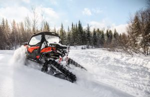 CAN-AM MAVERICK BREAKS FREE FROM THE SHACKLES OF WINTER WITH NEW APACHE TRACK KIT